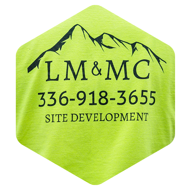 A yellow shirt with the words lm & mc on it.